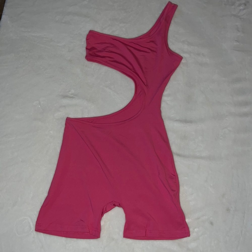 Xxs spandex soft material one piece short outfit. Pink